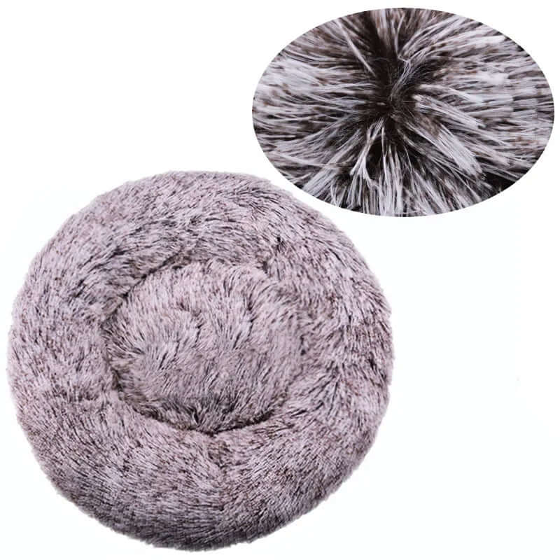 Round super soft pet bed with fluffy plush material, ideal for dogs and cats of all sizes.
