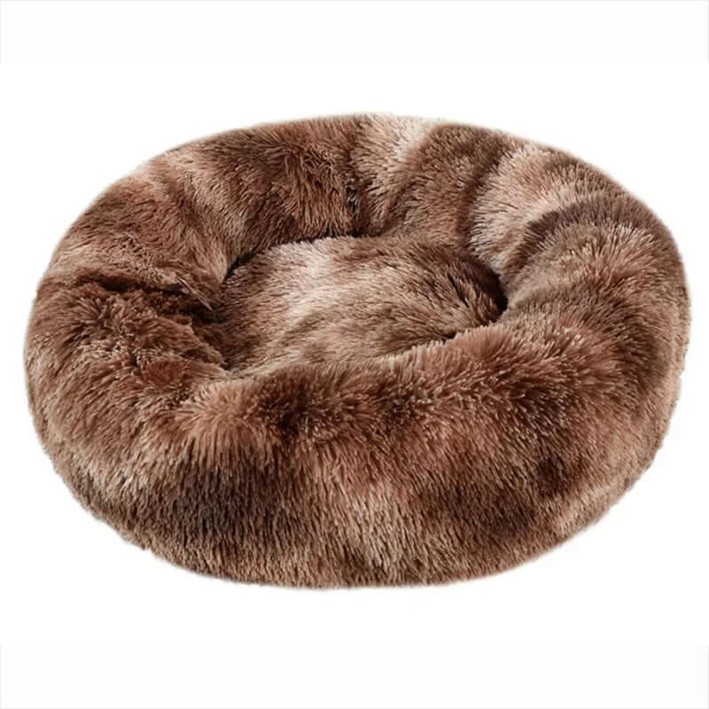 Super soft round plush pet bed for dogs and cats, ideal for winter warmth and comfort.